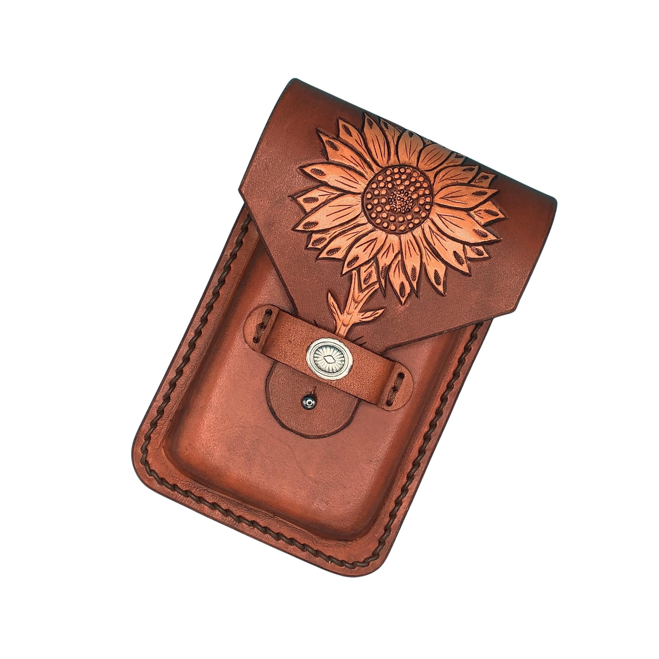 Leather phone holder for saddle billet strap with hand tooled sunflower.