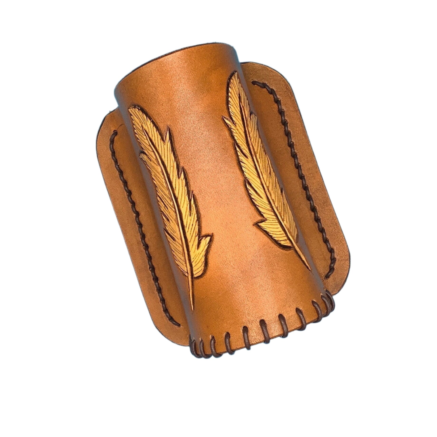 A tan leather bottle holder for saddle rear cinch with hand tooled feathers.