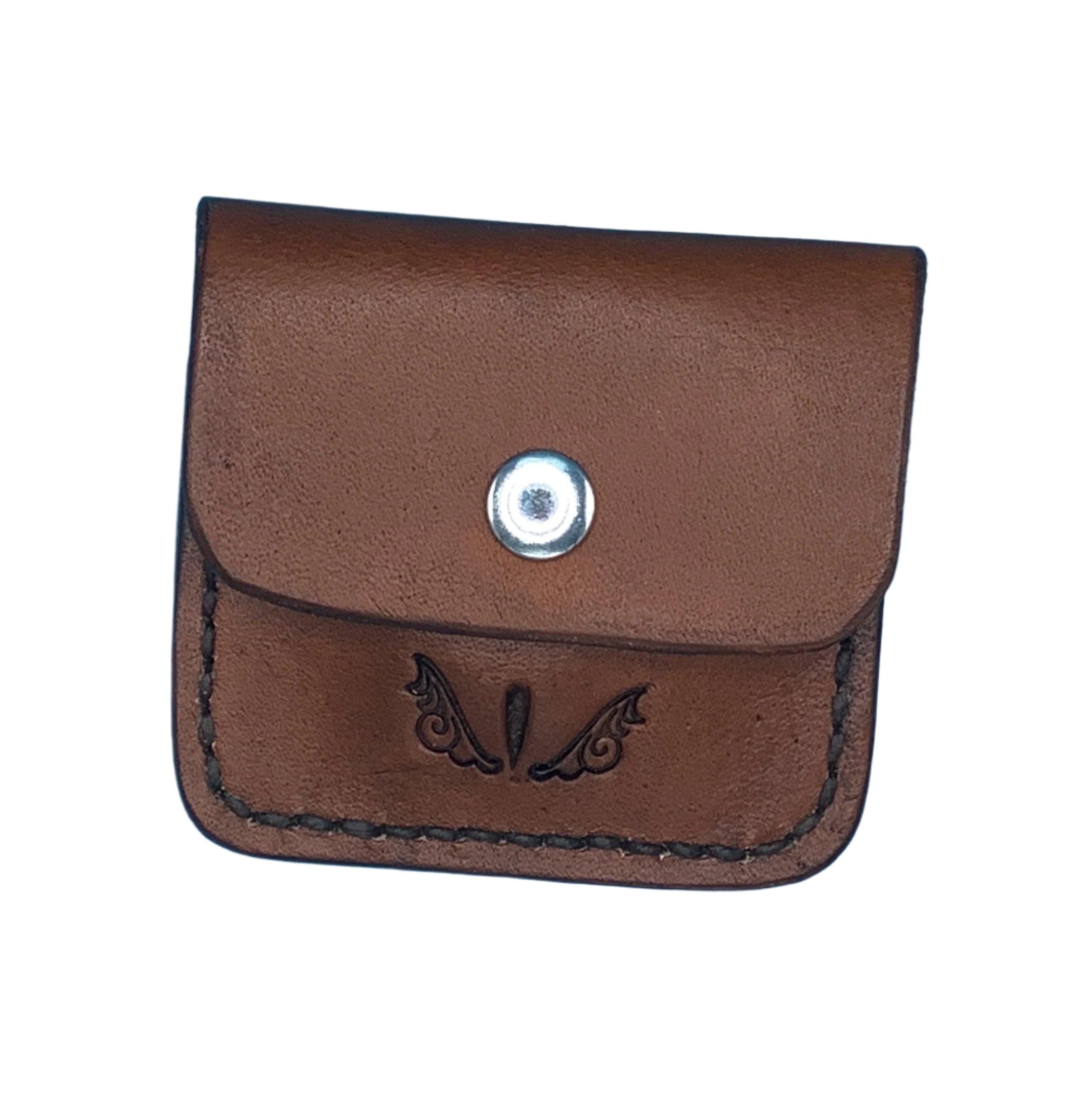 A medium brown leather folding hoof pick  holder for a rear cinch on a saddle.