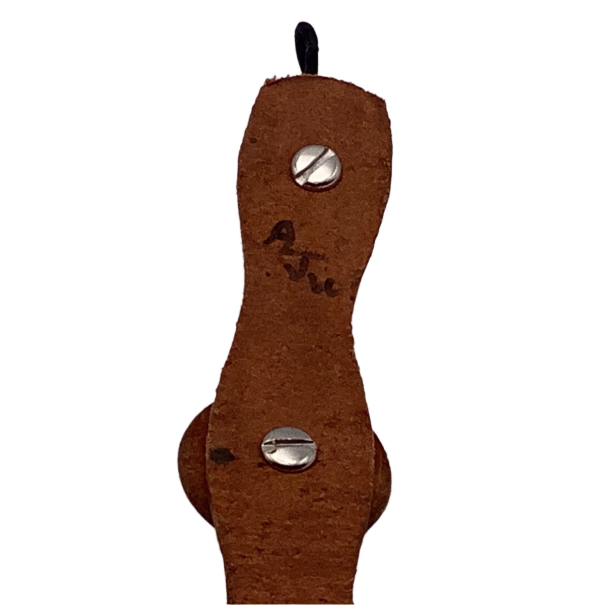 The inside of a basketweave bracelet showing the makers mark.