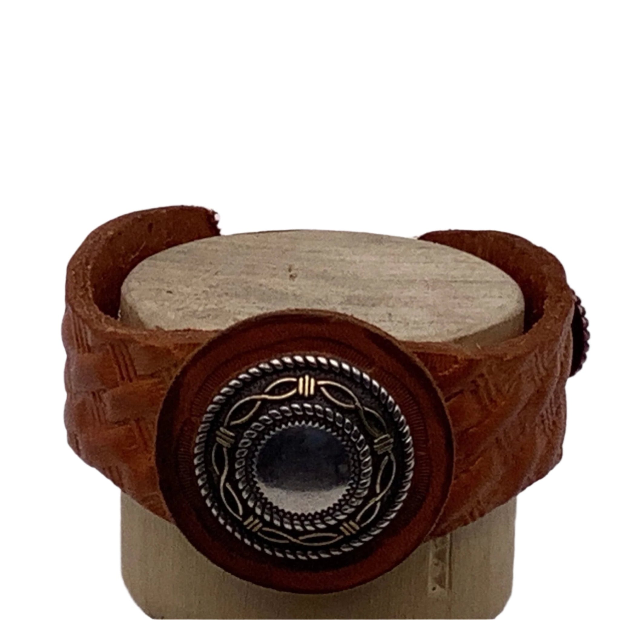 Leather basketweave bracelet with a silver concho.