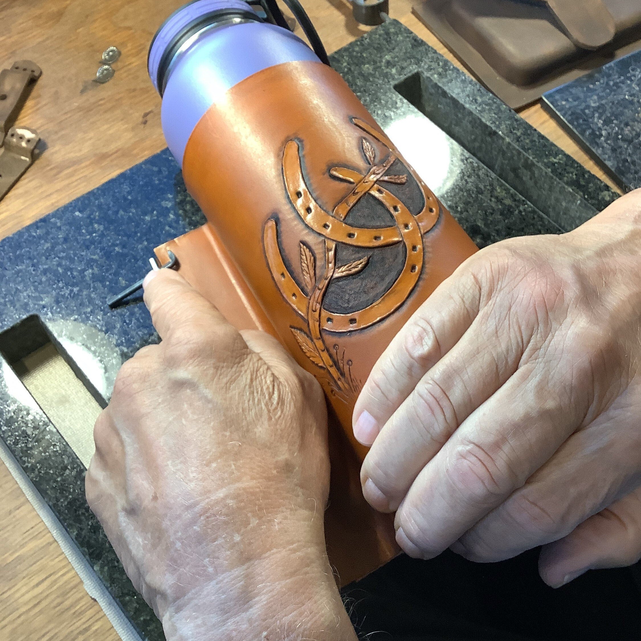 Hank making a bottle holder.