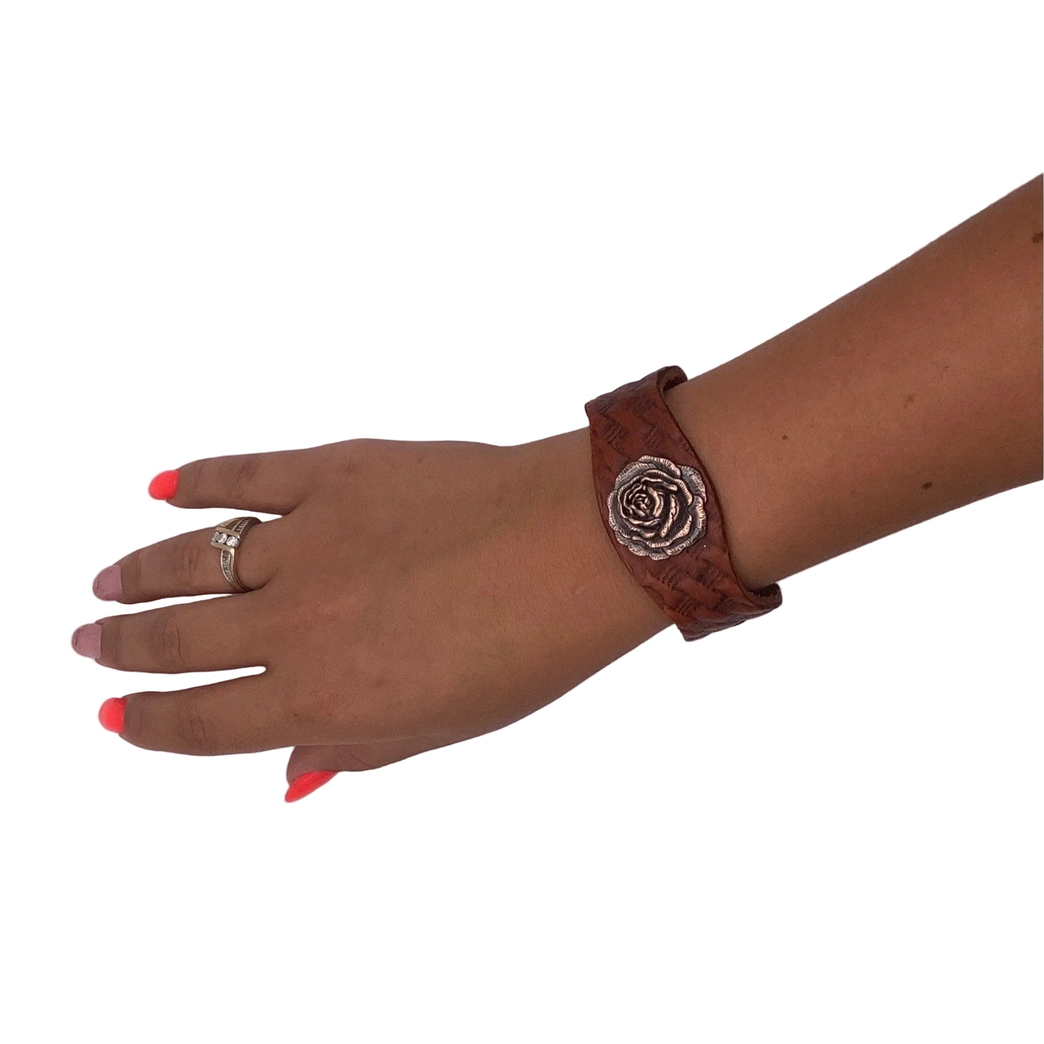  Brown leather basketweave bracelet with stretch clasp on wrist.
