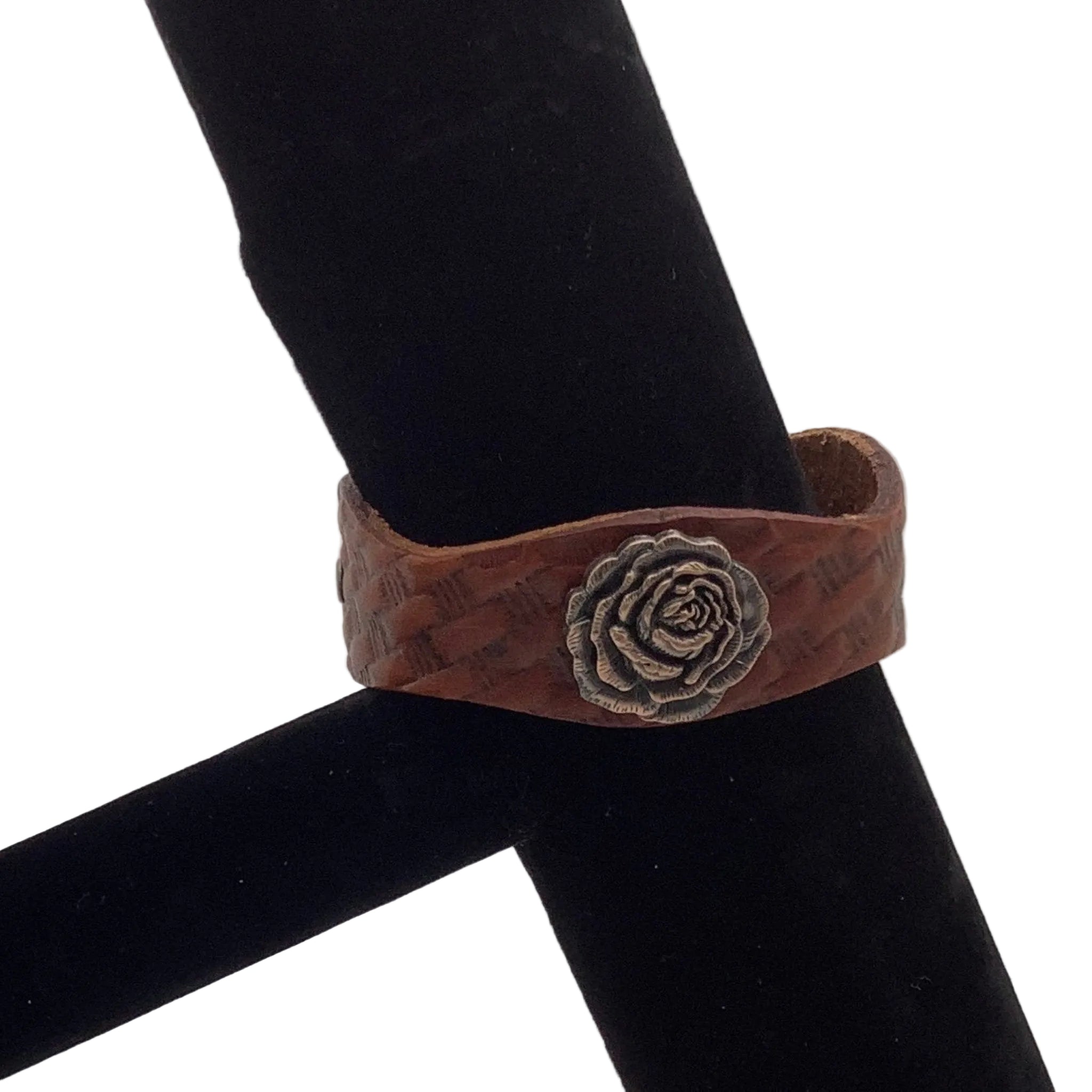  Leather basketweave bracelet showing copper rose concho detail.
