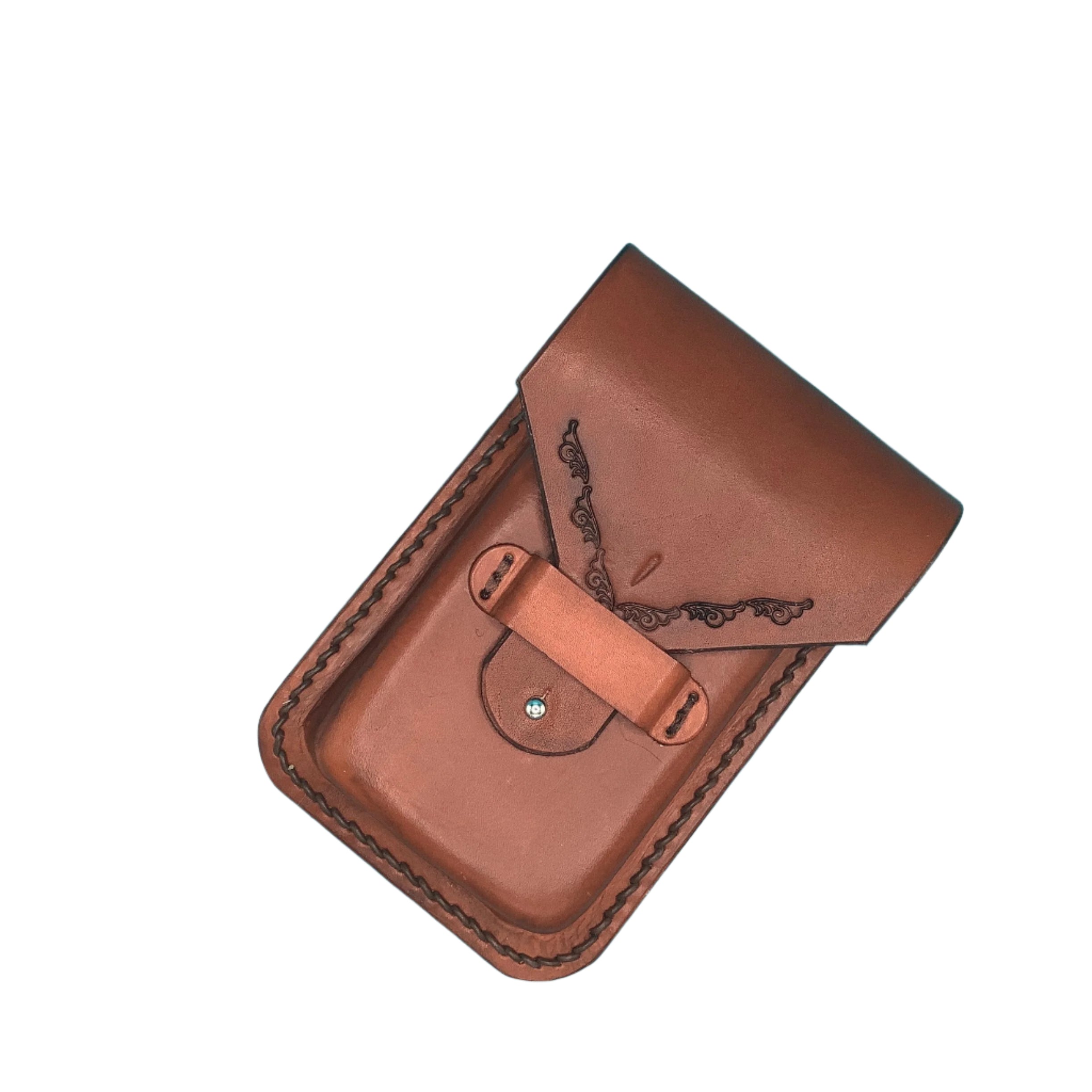 A light brown leather phone holder for saddle billet strap with scrolling on the flap.