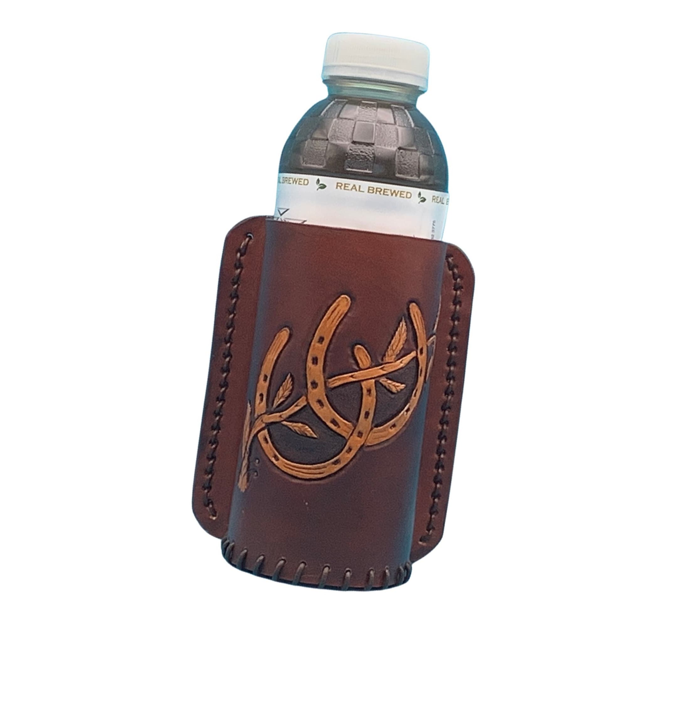 A mahogany leather drink holder for a saddle billet strap with hand tooled horseshoes.