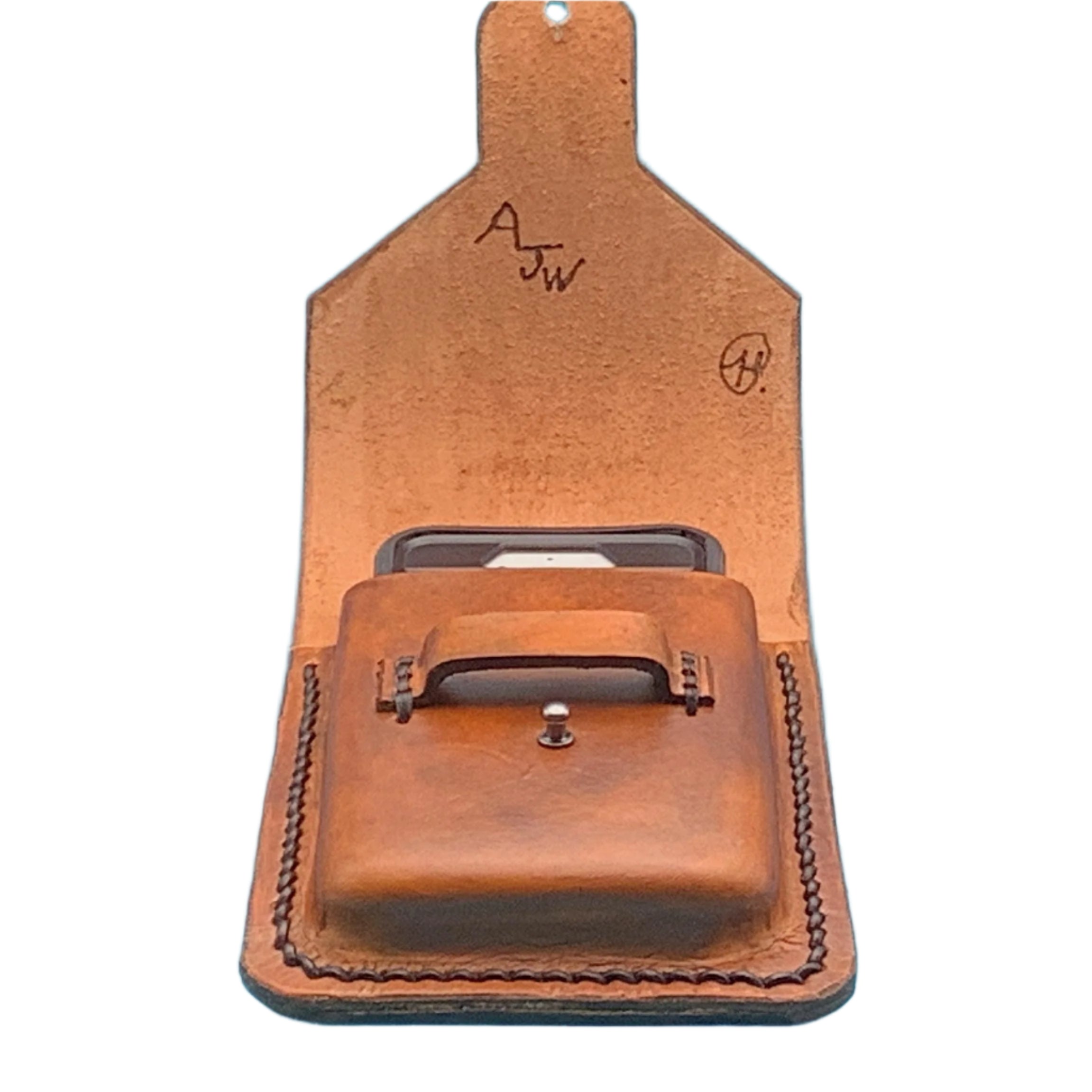A tan leather phone holder for saddle billet strap shown open with a phone in it.