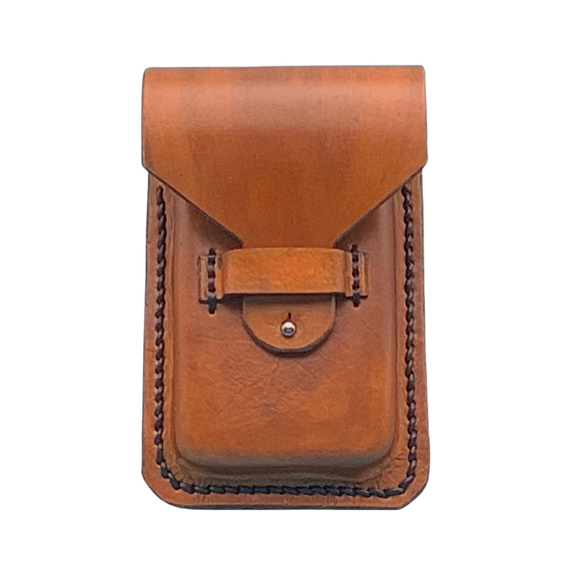A tan phone holder  for saddle billet strap.