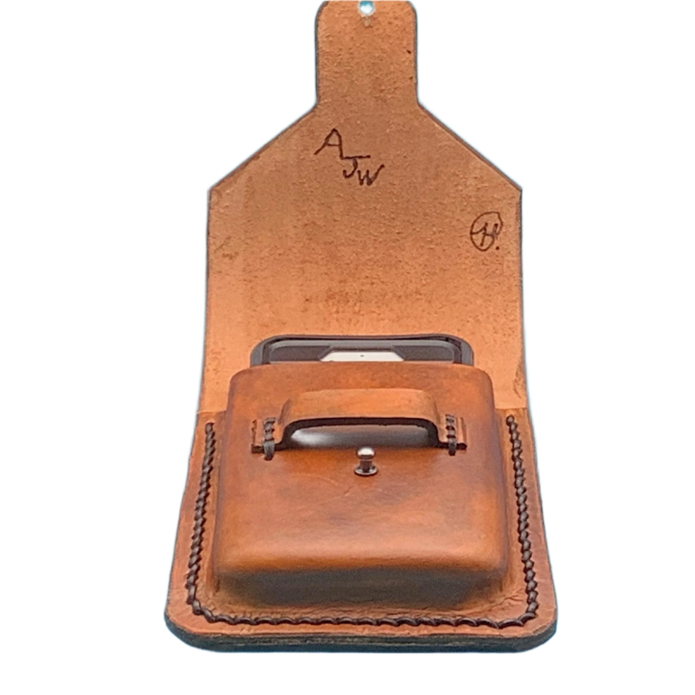 A tan phone holder and drink holder for saddle billet strap shown open with a phone in it.