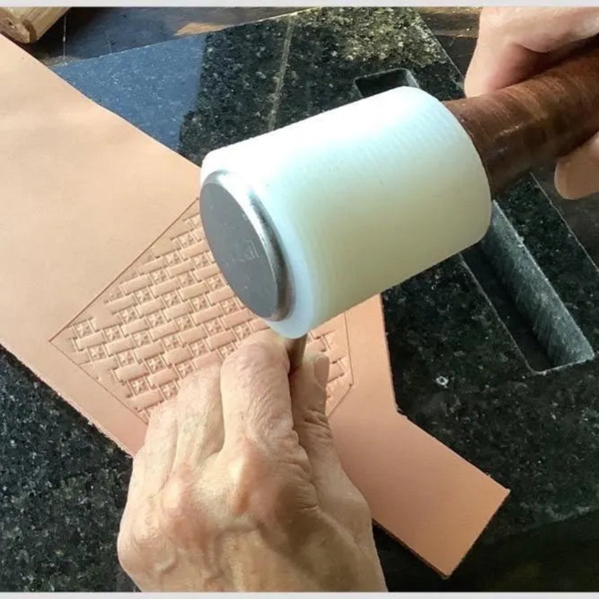 Leather worker tooling leather.