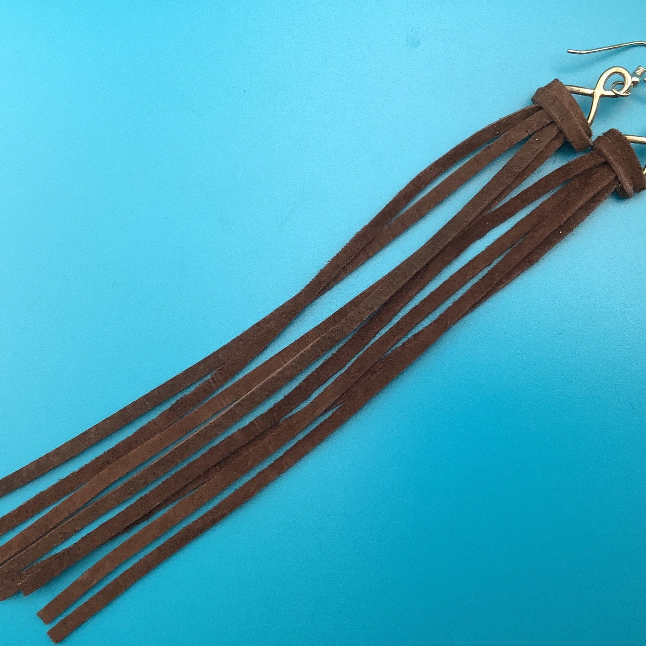 Boho leather fringe earrings.