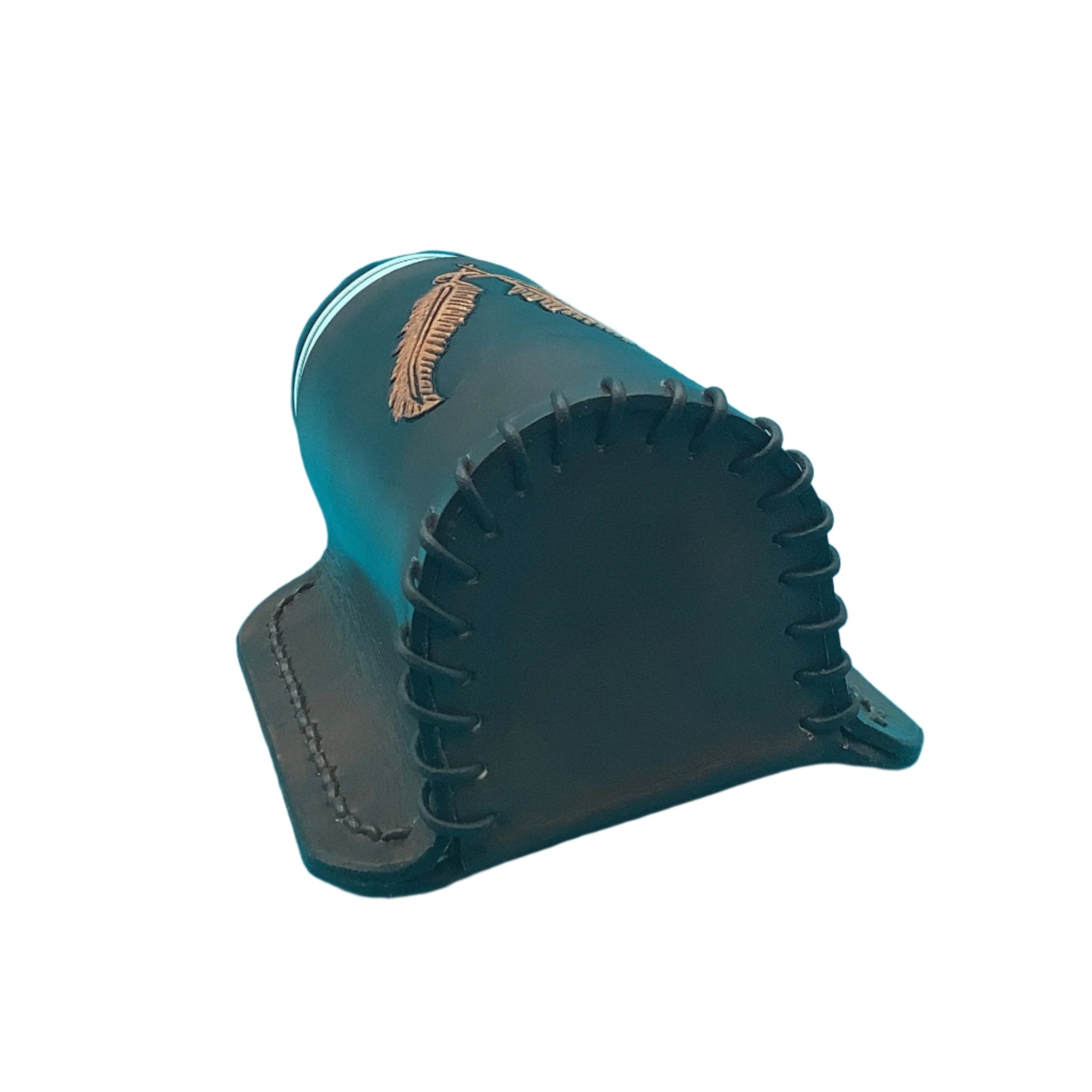The bottom of a dark brown leather saddle bottle holder with hand tooled feathers. 